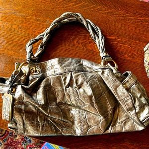 B. Makowsky gold leather bag